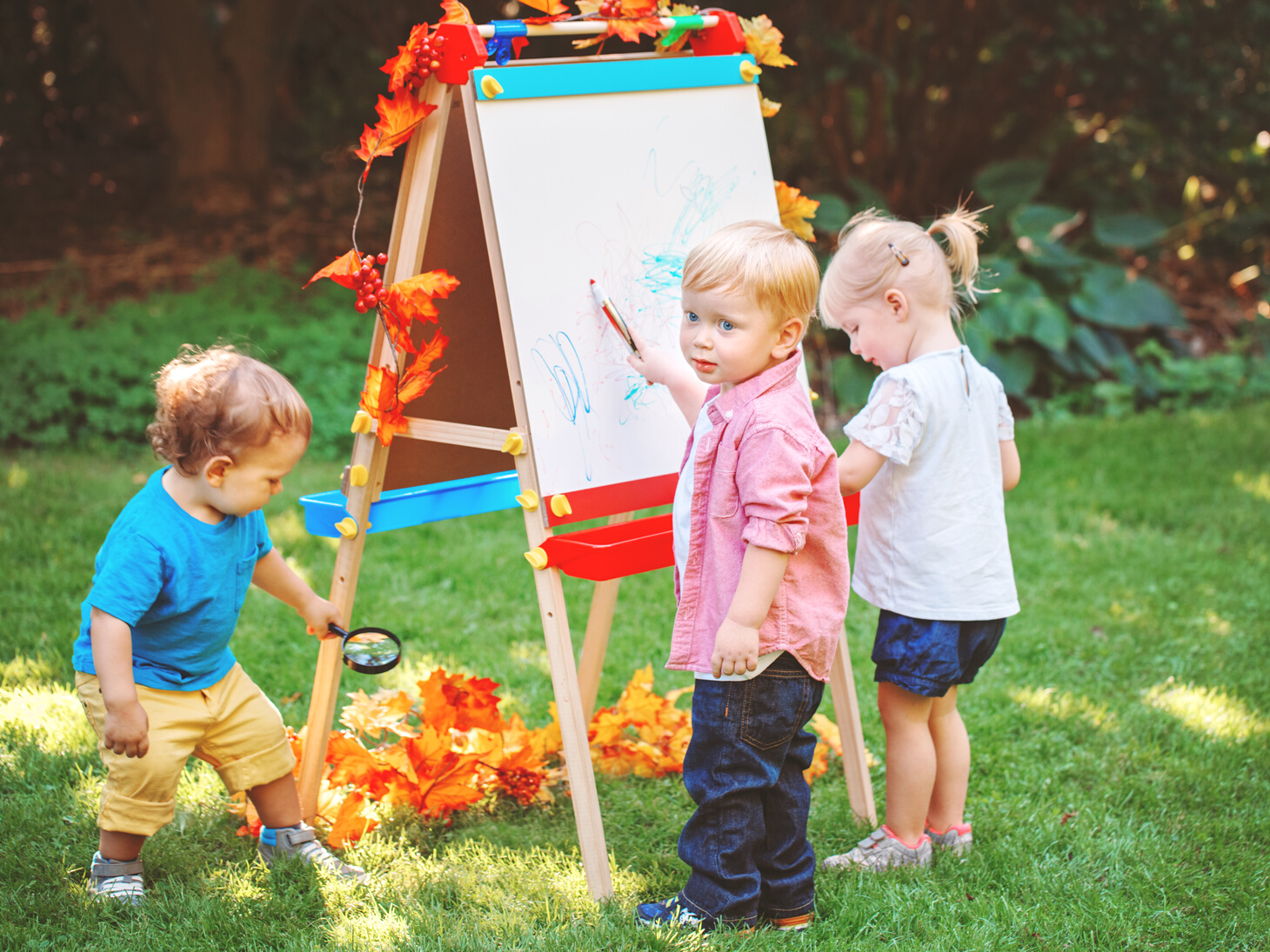 Toddlers Playing Outdoors